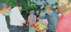 Distribution Of Food Grain And Sanitizer